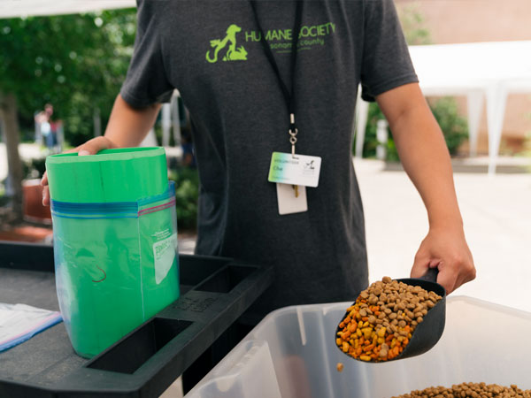 Food being bagged from the Pet Food Pantry