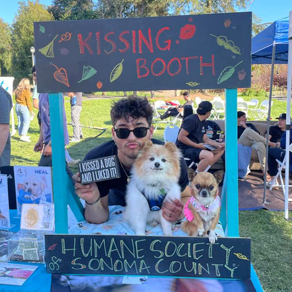 Phi Delta Theta fraternity with the HSSC Kissing Booth during Philanthropy Week at Sonoma State University